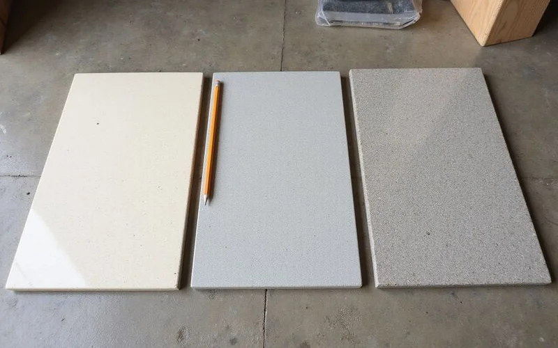 Three side-by-side polished concrete swatches: cream, salt-and-pepper, exposed aggregate